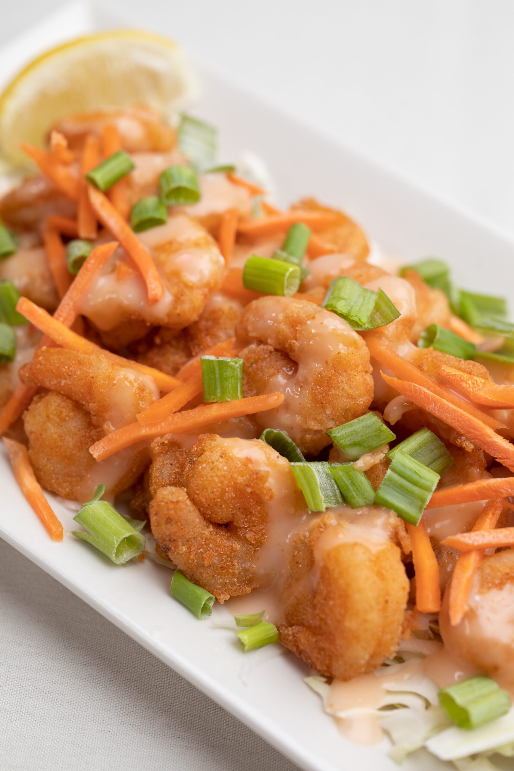 Crispy Shrimp. Thai Chili Sauce. Carrots. Scallions